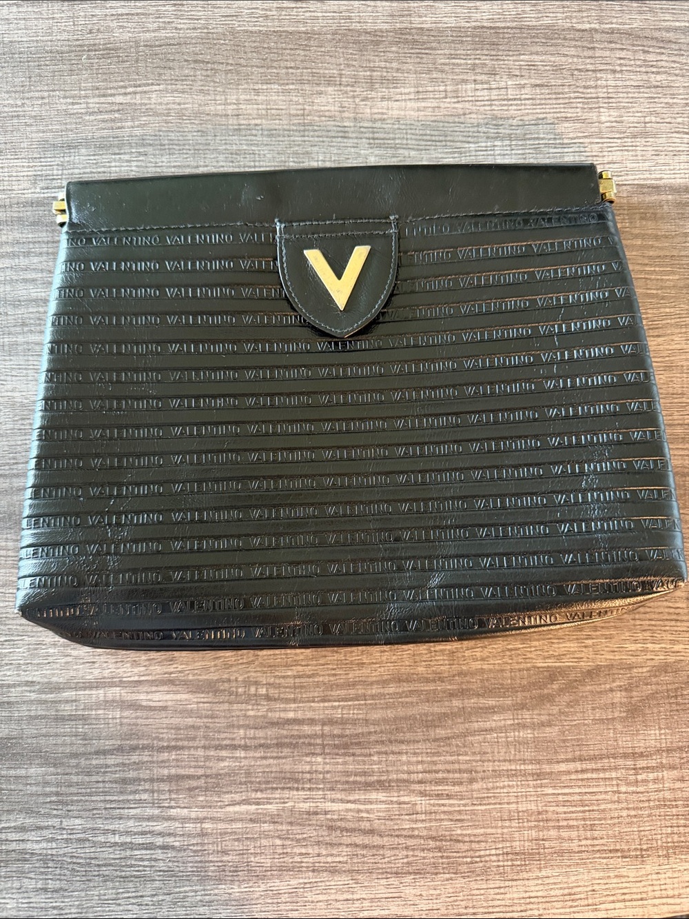 Valentino Black Leather V-Emblem Clutch with Gold Accent